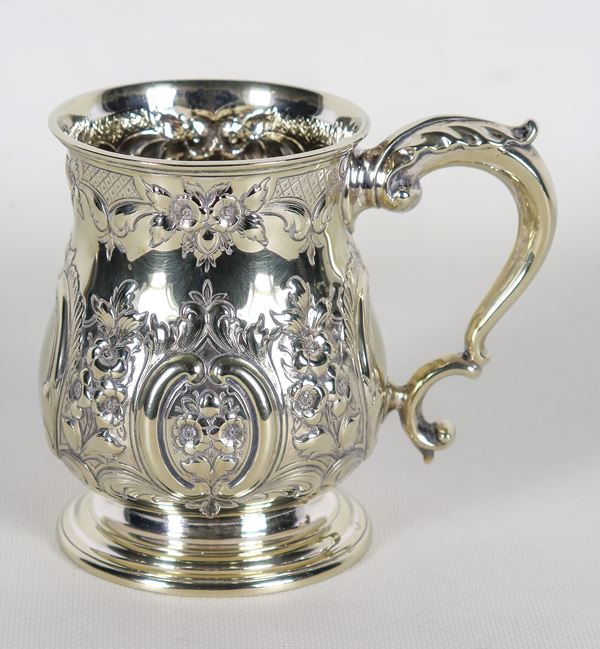 Ancient English Sheffield tankard, entirely chiseled and embossed with scrolls, flowers and rosettes. Mid 19th century