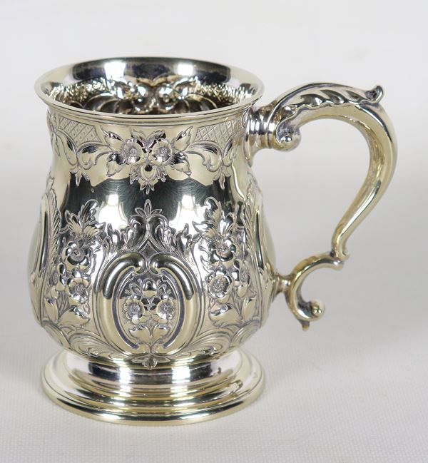 Ancient English Sheffield tankard, entirely chiseled and embossed with scrolls, flowers and rosettes. Mid 19th century