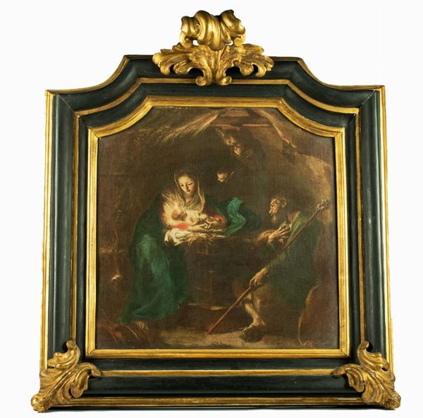 Roman frame in ebonized and gilded wood