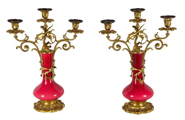 Pair of antique French candelabra in the shape of Chinese vases, in antique pink porcelain and gilded bronze, embossed and chiseled with scrolls, curls and shells, 3 flames each