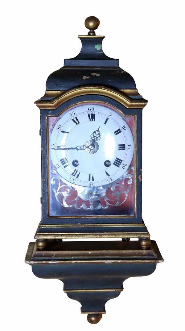 Antique cartel clock with shelf from Terrot et Thuillier in Geneve (1780), in black lacquered wood and golden profiles, white enamel dial and Roman numerals. Not working, to be serviced