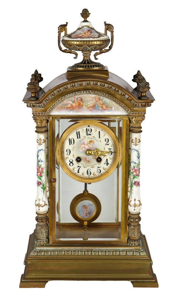 Antique Janetti Padre e Figli table clock (Florence 1866-1890), architectural shape in gilt bronze, porcelain and champlevé enamel, movement built in France for the Italian market, dial signed with Arabic numerals. Not working, to be serviced