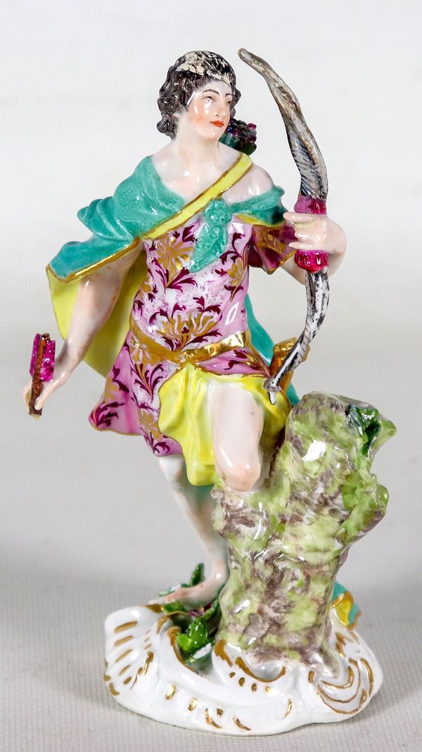 'Archer', ancient colorful porcelain figurine from Meissen, 19th century. Two small flaws on the bow and arrow