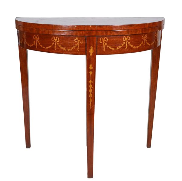 Semi-round game table in walnut and bois de rose, with inlays of floral scrolls, amphora and garlands. Folding top with green leather covering inside, four legs, one of which is extractable