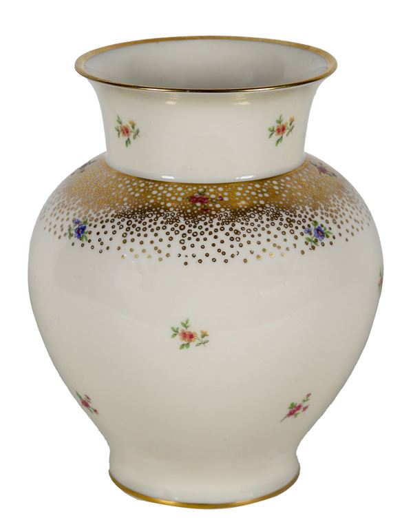 Small Bavarian porcelain vase, with polychrome decorations of bunches of flowers and pure gold