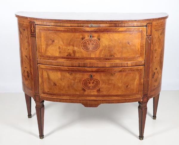 Neapolitan demi-lune chest of drawers in walnut in the Louis XVI style, with inlaid fillets and rosettes with amphorae and flowers. Two drawers and four inverted pyramid-shaped legs 