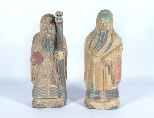 &quot;Santoni&quot;, a pair of Chinese sculptures in decorated and polychrome wood