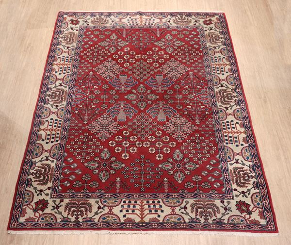 Persian Hamadan rug with geometric patterns on red background and white border