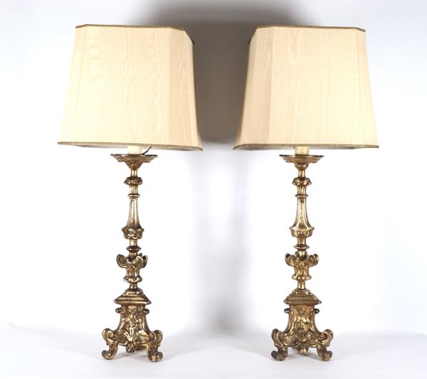 Pair of antique gilded wooden torch holders with mecca and carved Louis XIV motifs, converted to electric light