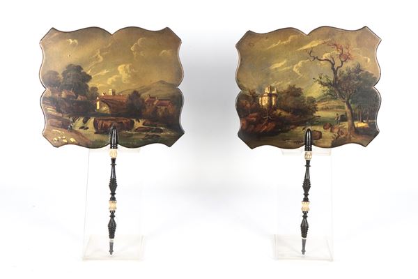 Pair of antique English fans from the Queen Victoria period, in papier maché with a shaped form, lacquered and painted with &quot;Landscapes&quot; in the centre