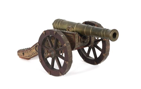 Model of a 17th century cannon in bronze and wood