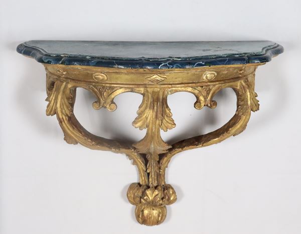 Antique wall shelf in gilded wood and carved with Louis XV motifs with faux marble top 