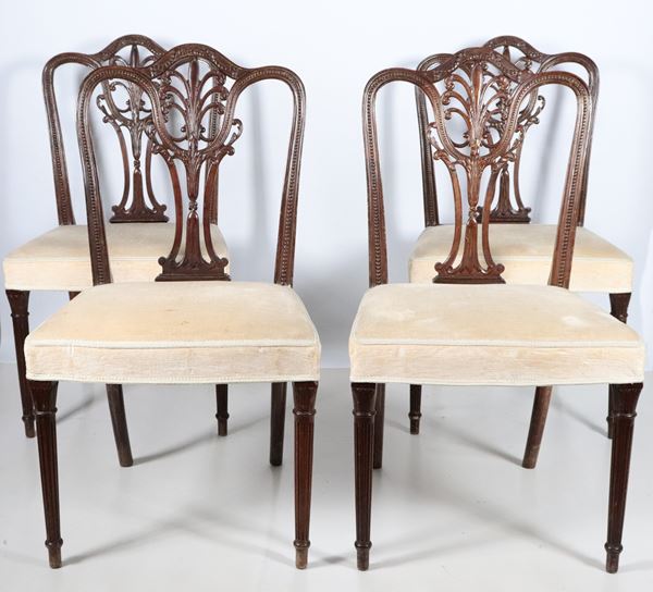 Lot of four English chairs in mahogany from the Applewhite line with carved and perforated backrests, covering in Havana velvet