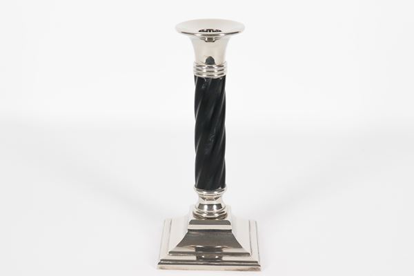 Silver metal candlestick with column stem worked in a black marble-look torchon