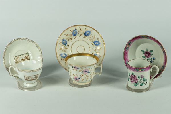 Three porcelain cups with saucers