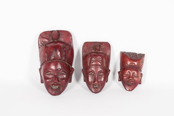 Lot of three small antique Chinese carved wooden masks