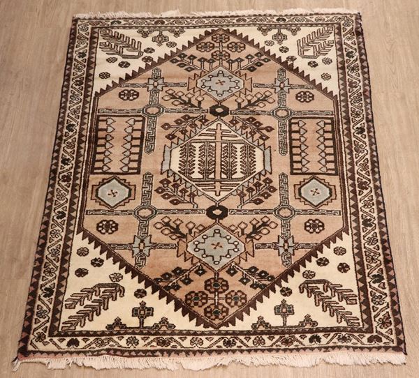 Yagcibedir carpet with geometric designs on a brown and brown background