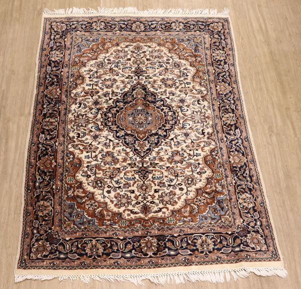 Persian Nain rug, mixed silk, geometric floral design on a brown and brown background and blue border 