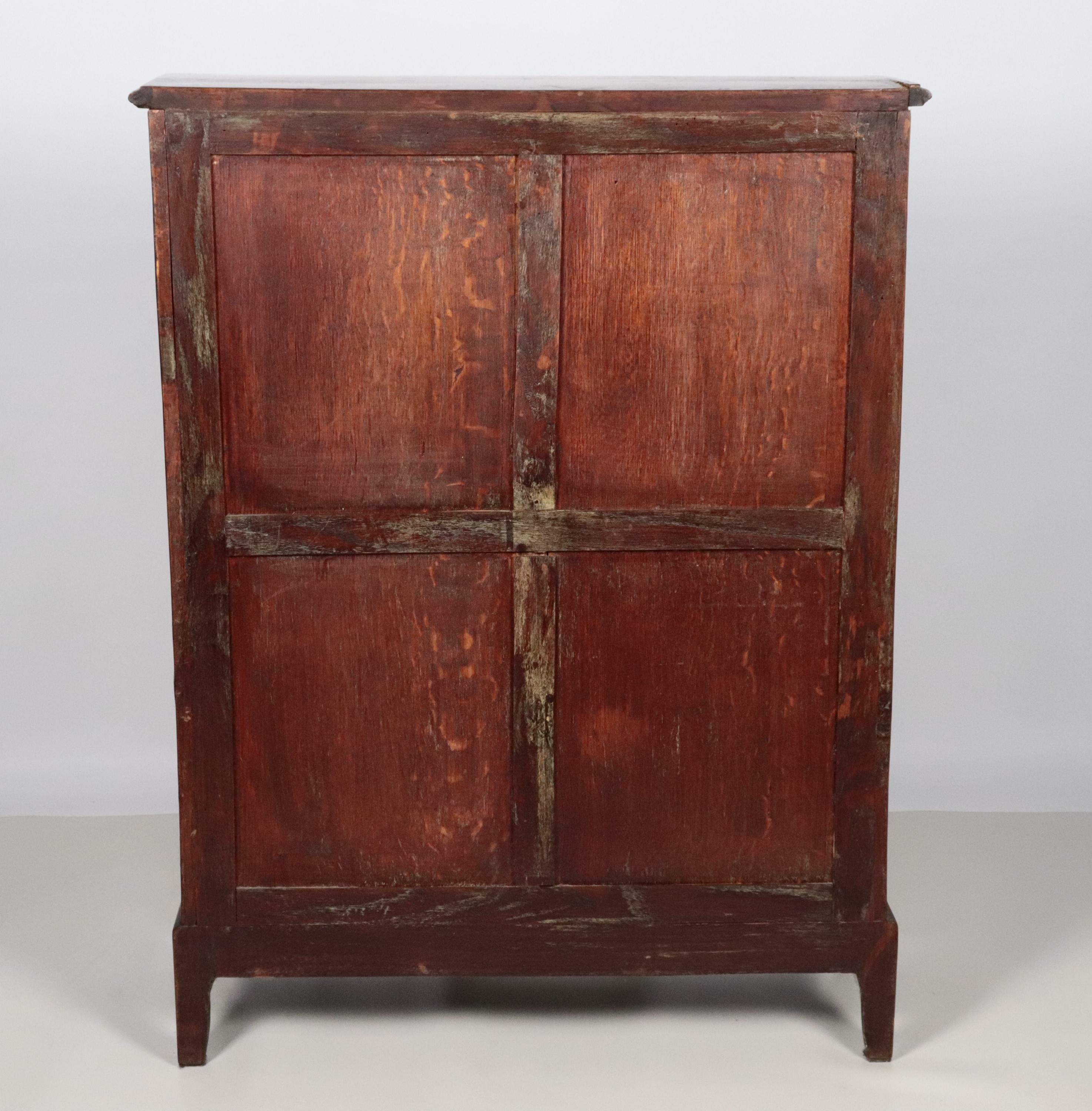 Antica credenzina francese in bois de rose, ebano viola e mogano a due sportelli pannellati e qua...