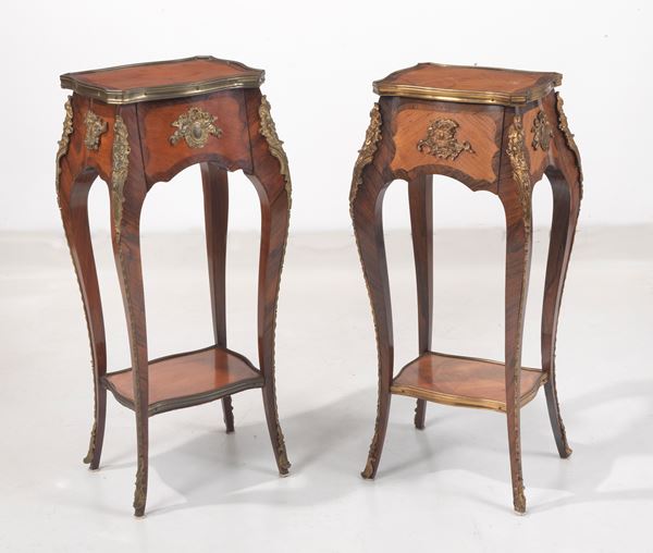 Pair of French rognon gueridons in mahogany, rosewood and purple ebony, with friezes and fittings in gilded bronze, embossed and chiselled, a central drawer and four curved legs joined by a small shelf underneath