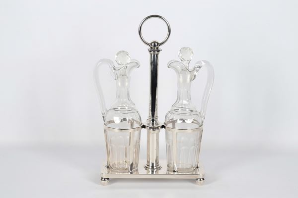 Silver-plated metal oil cruet from the Empire line, with 2 crystal ampoules, one of which has a glued-on handle