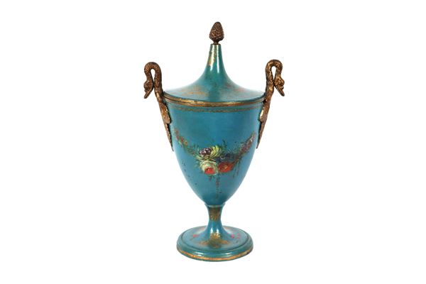 Antique French amphora in light blue lacquered metal, with multicoloured floral garlands and gilded bronze handles in the shape of swans 