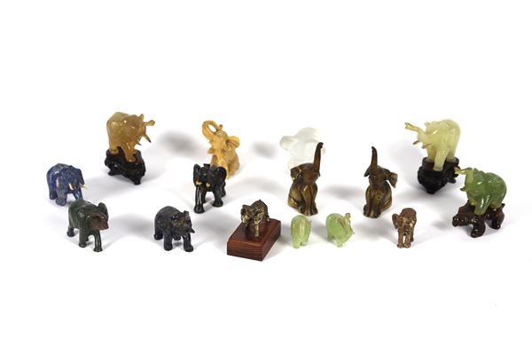 Collection of fifteen figurines of &quot;Elephants&quot; in various materials: jade, lapis lazuli, crystal etc. Various shapes and sizes