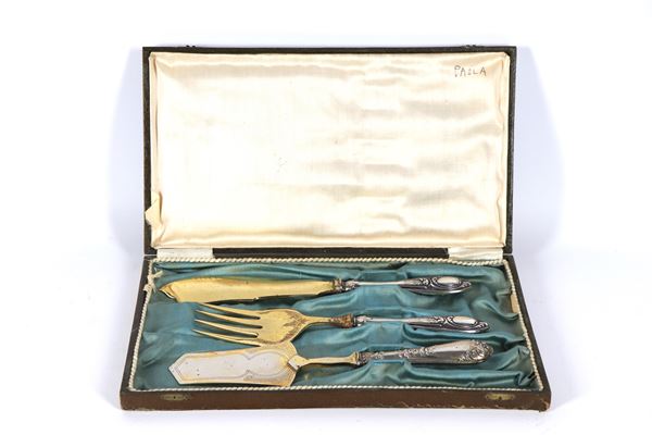 Lot of three dessert cutlery sets in vermeil with chiselled and embossed silver handles, with attached defective case