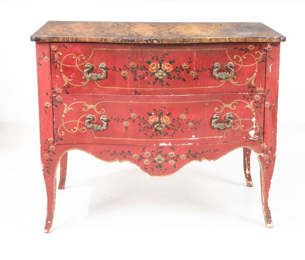 Antique Louis XV style chest of drawers from the Marche region, in red lacquered wood decorated and polychromed with flower bouquet motifs, two drawers, fake marble top and four curved legs