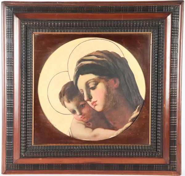 Pittore Italiano Inizio XX Secolo - Firmato. "Madonna con Bambino", dipinto ad olio su tavola in cornice di pero ebanizzato e decorato