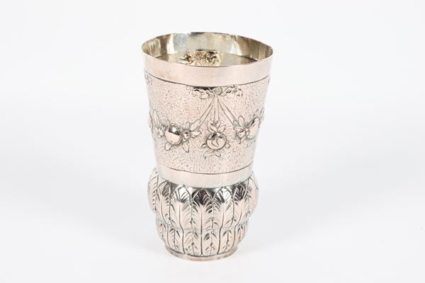 Antique silver glass, chiseled and embossed with bow and scroll motifs, 160 gr.