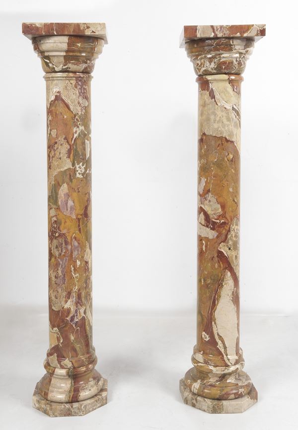 Pair of Pavonazzetto marble columns with capitals