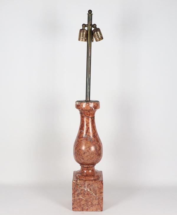 Marble column shaped table lamp. Defect on the stem