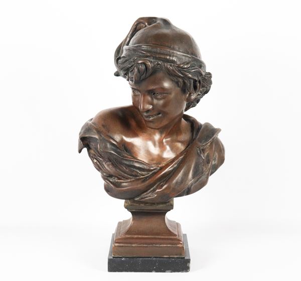 &quot;Smiling urchin&quot;, bronze bust supported by a quadrangular marble base. Signed