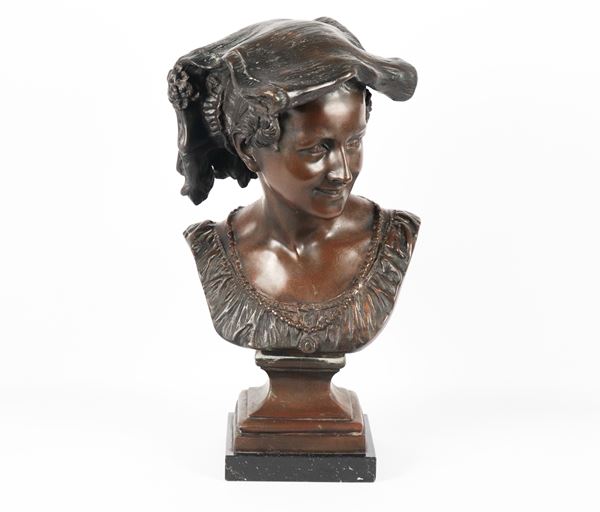 "La Ridente napoletana", busto in bronzo sorretto da base quadrangolare in marmo. Firmato