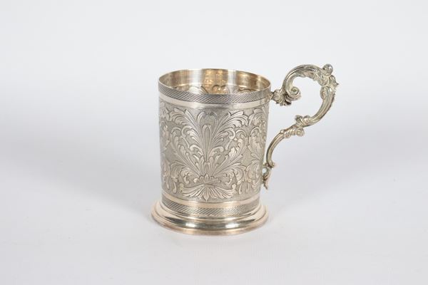 Small silver mug, chiseled and embossed with plant motifs, curved handle, 210 gr.