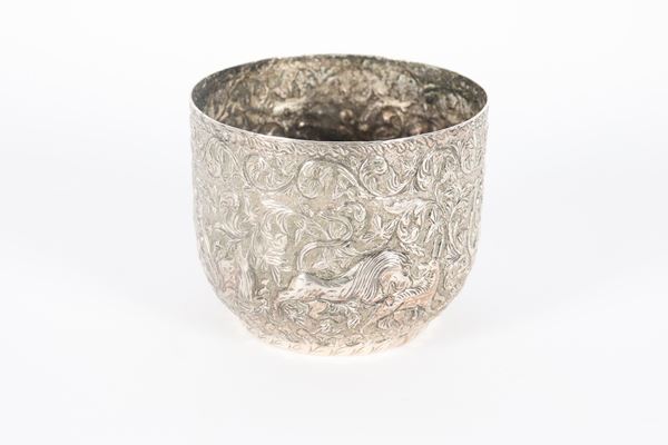 Oriental silver cup entirely chiseled and embossed with floral and animal scroll motifs, 270 gr.