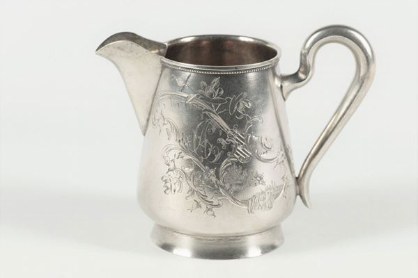 Milk jug in silver