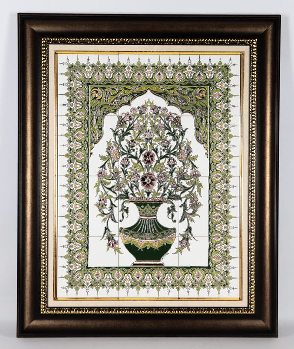 Large Persian tile in white glazed ceramic decorated with polychrome enamels with vegetal motifs, wooden frame and leather case