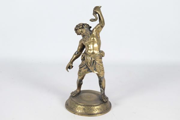 "Sileno con il serpente", piccola scultura in bronzo dorato e cesellato. Lievi difetti