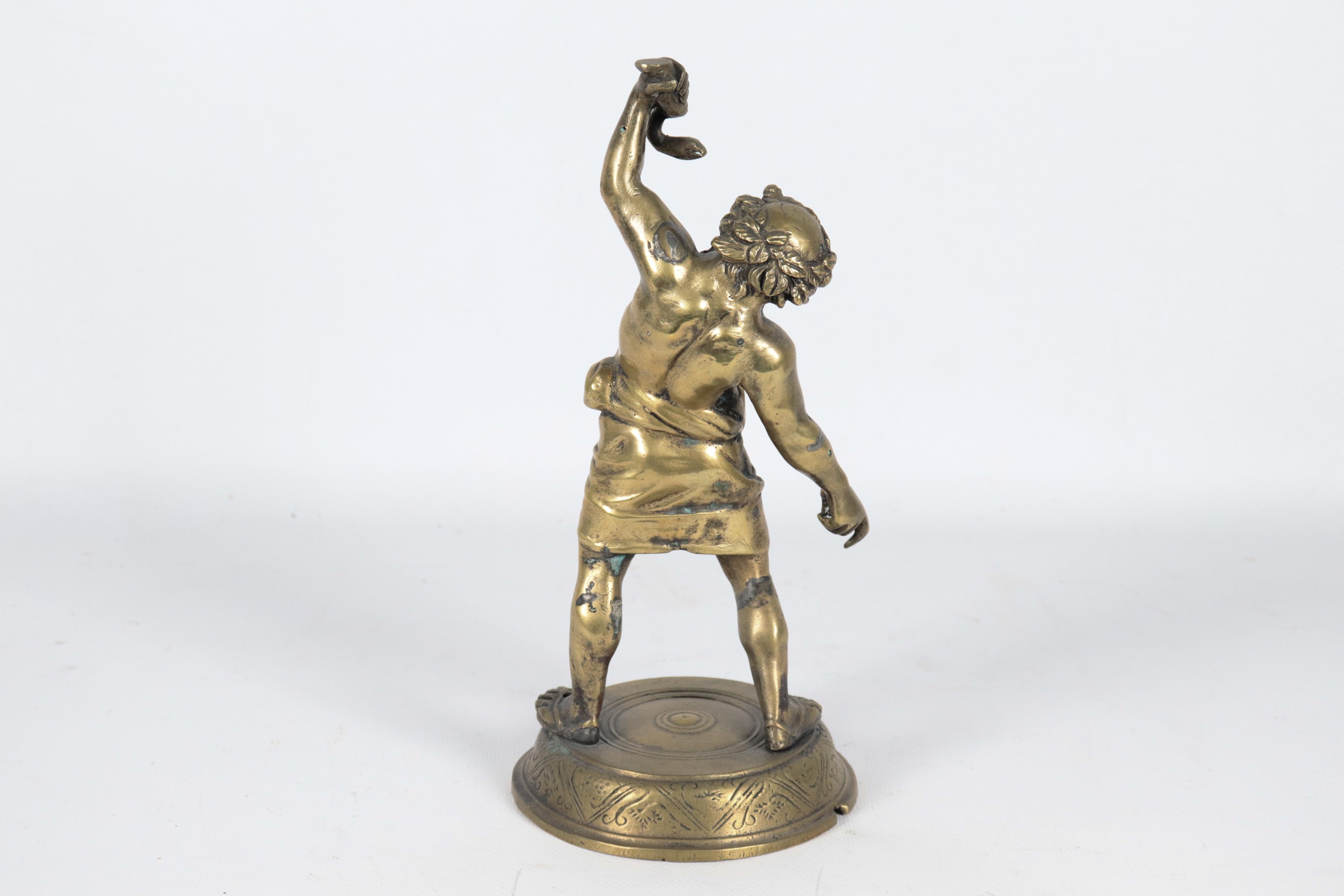 "Sileno con il serpente", piccola scultura in bronzo dorato e cesellato. Lievi difetti