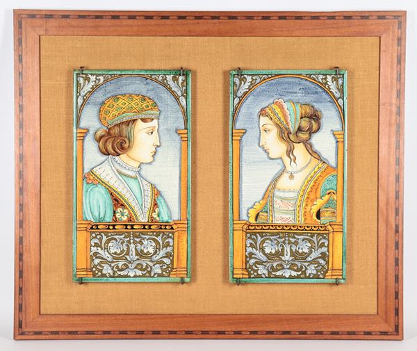 Pair of polychrome Deruta majolica tiles &quot;16th century characters&quot;, wooden support in walnut frame