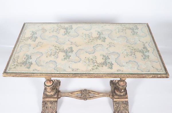 Louis XVI style gilded and carved wooden living room table, top in antique worked fabric