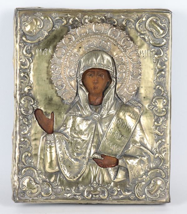 &quot;Madonna&quot;, ancient Russian icon painted on a panel with a silver-plated, embossed and chiseled copper frame. 19th Century