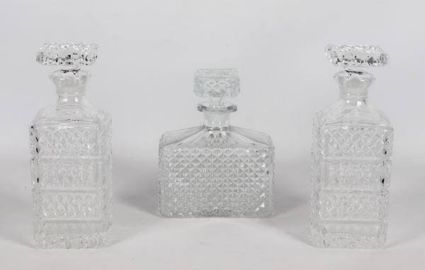 Lot of three square and rectangular shaped liquor bottles in diamond-point worked crystal