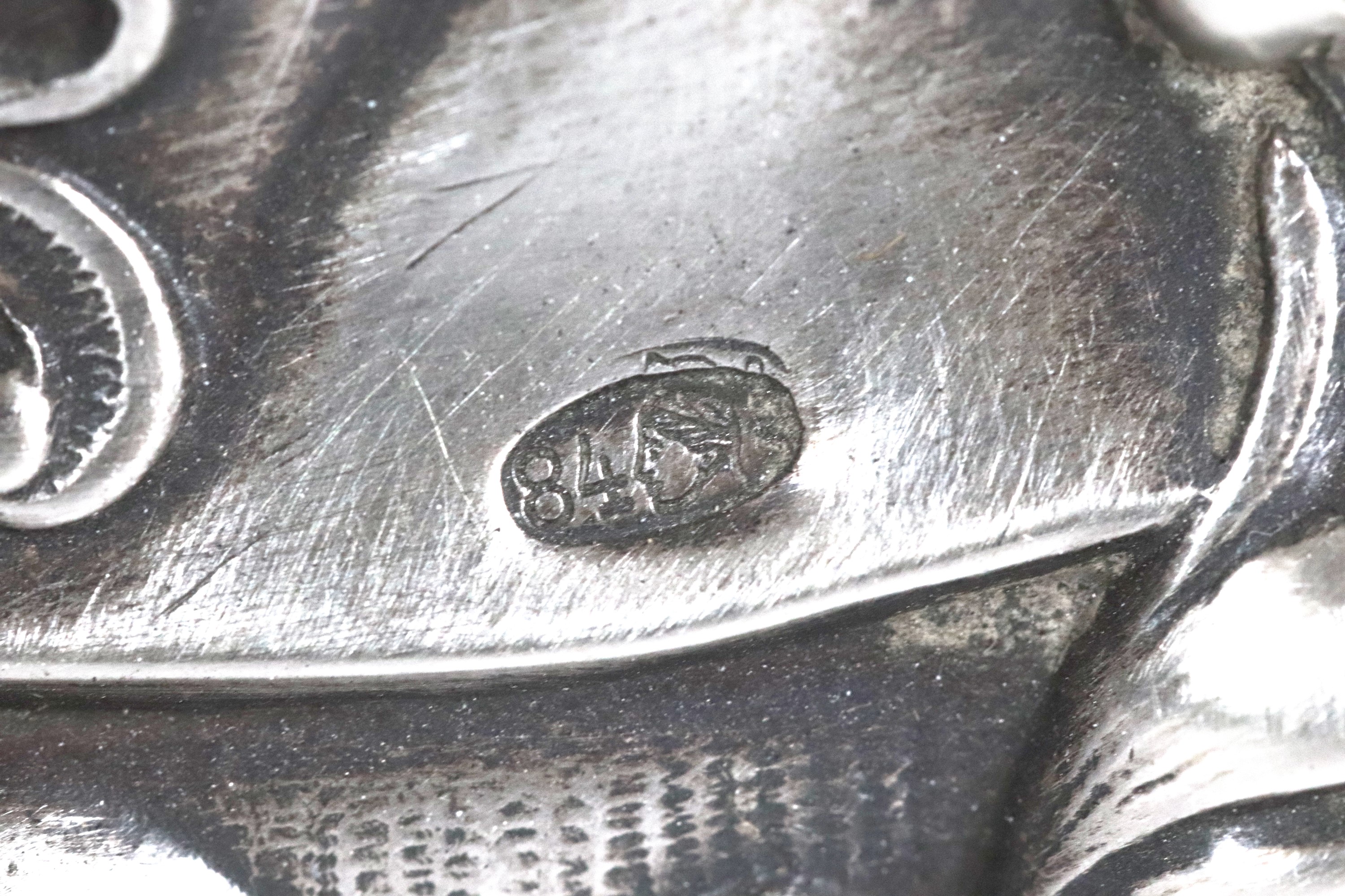 Antico candeliere russo in argento, interamente cesellato e sbalzato a motivi Luigi XV, gr. 430. ...