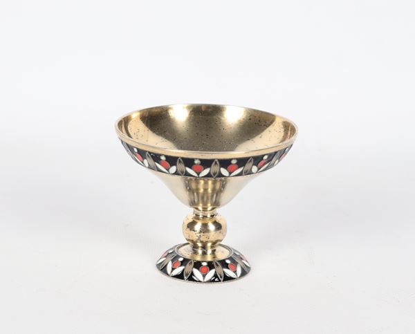 Antique small cup in vermeil silver, edges worked in relief with floral motif enamels, 120 gr.