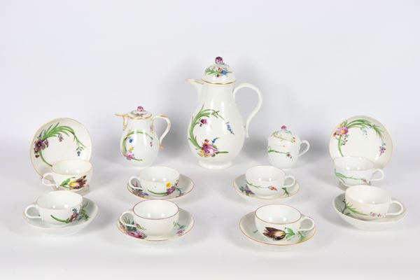 Antique Meissen porcelain coffee service, Marcolini Period, with polychrome decorations with floral motifs and leaf scrolls: coffee pot, milk jug, sugar bowl and eight cups with saucers (11 pcs.). Late 18th century