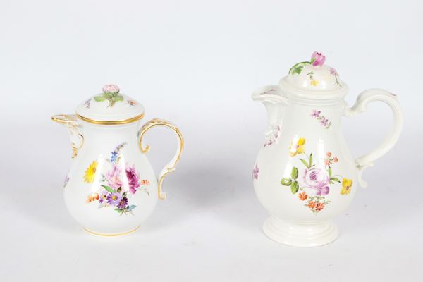 Antique lot of two Meissen and Old Vienna porcelain coffee pots, with floral polychrome decorations, different heights. 19th Century 