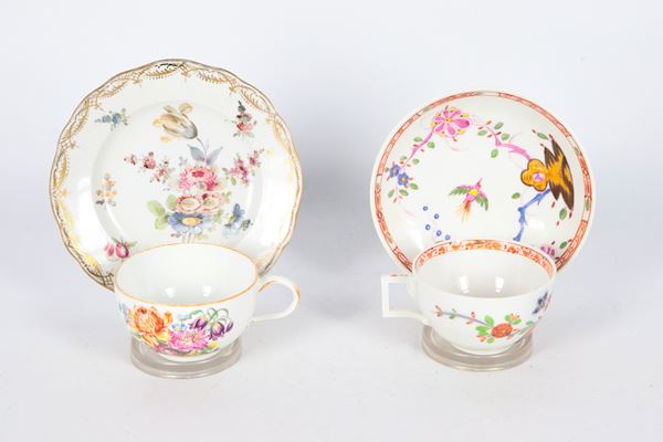 Antique Meissen porcelain lot of two cups with saucers, with polychrome floral decorations with different motifs. 19th century